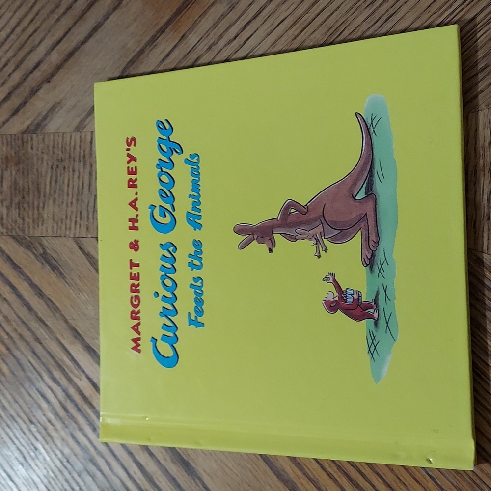 Curious George Feeds the Animals